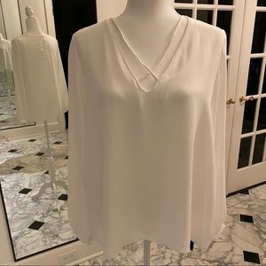 White blouse with neck detail
